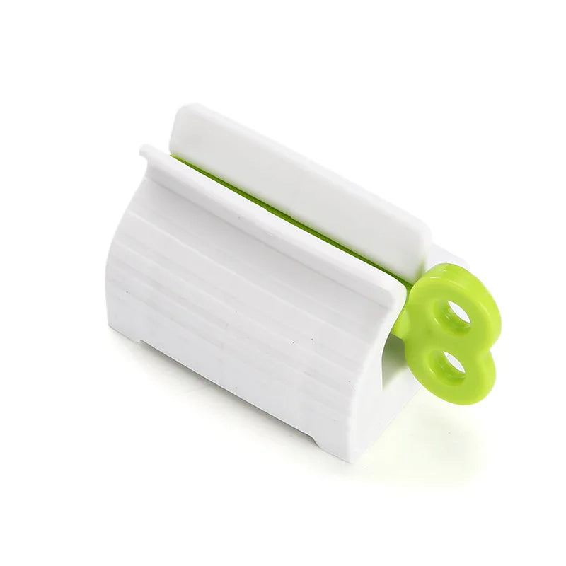 1 Pc Rolling Tube Toothpaste Squeezer Toothpaste Seat Holder Stand Rotate Toothpaste Dispenser for Bathroom